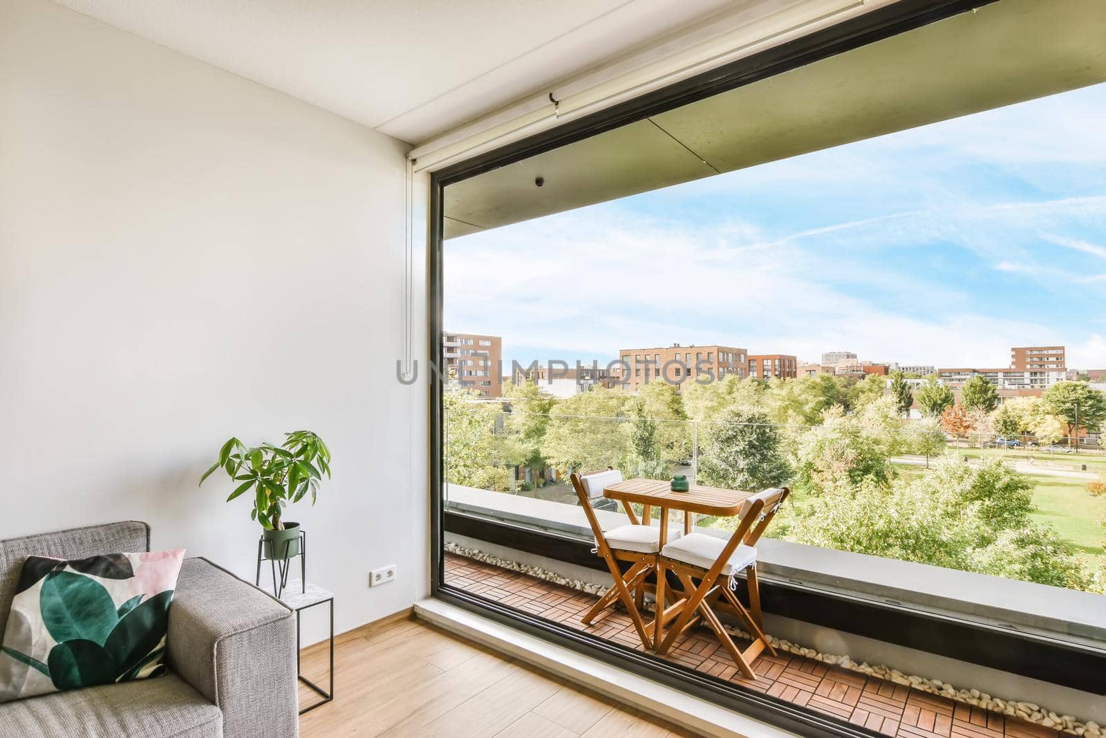 Stunning balcony with wooden table and chairs and mesmerizing views