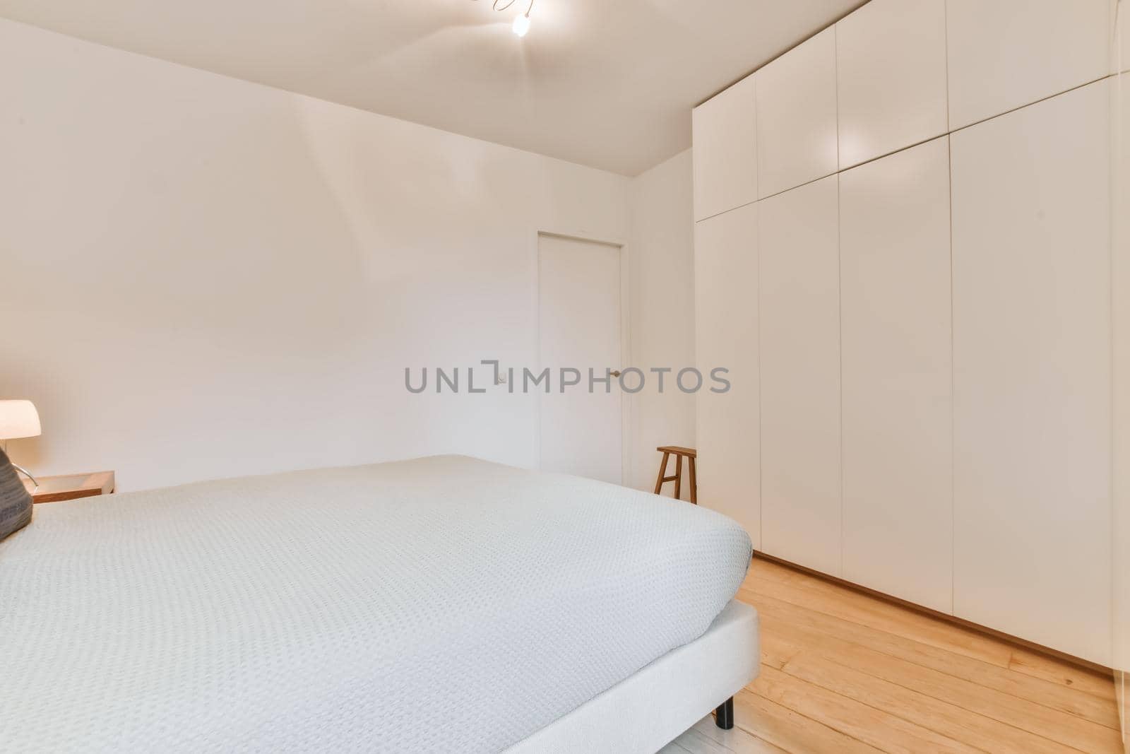 Interior of a cozy and bright bedroom with beautiful decoration