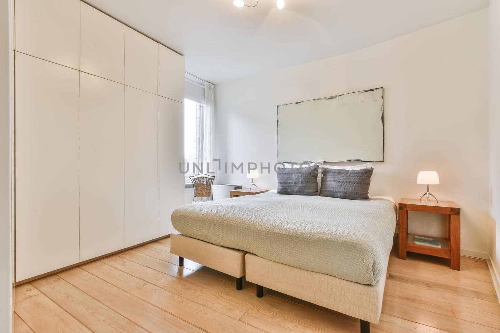 Interior of a cozy and bright bedroom with beautiful decoration