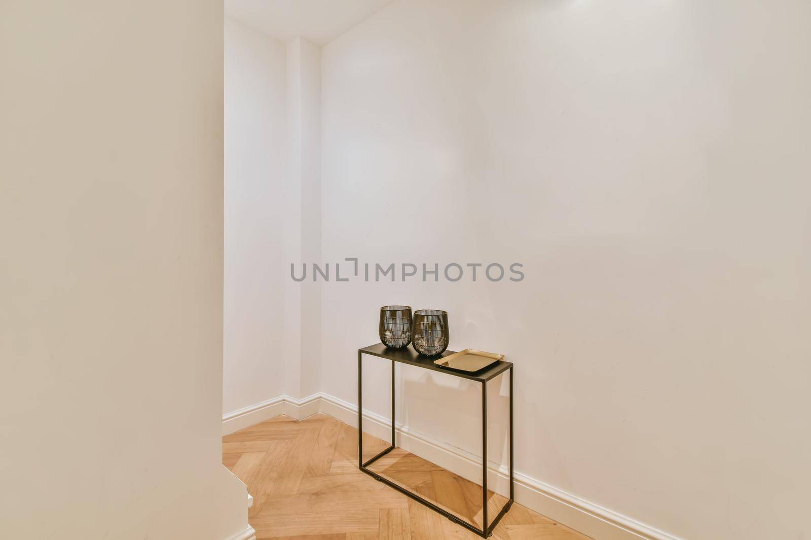 Corridor with iron coffee table and decor on it