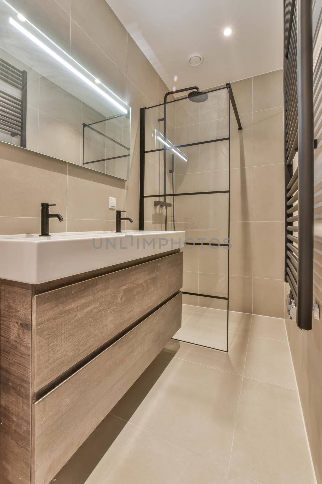 Stylish bathroom in a minimalist style by casamedia
