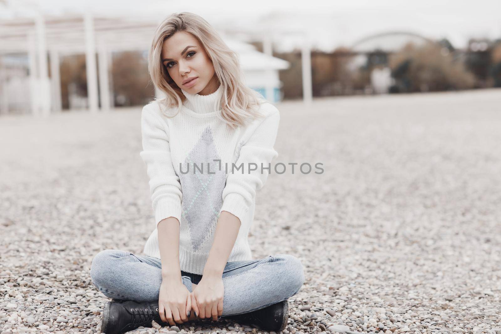 portrait of a beautiful woman outdoors by splash