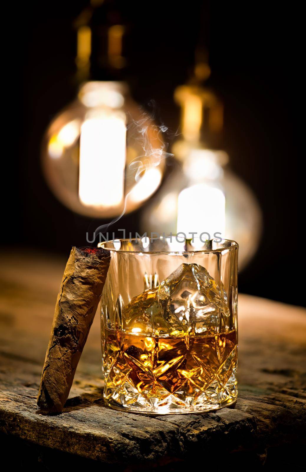 Cigar and glass with whiskey by Givaga