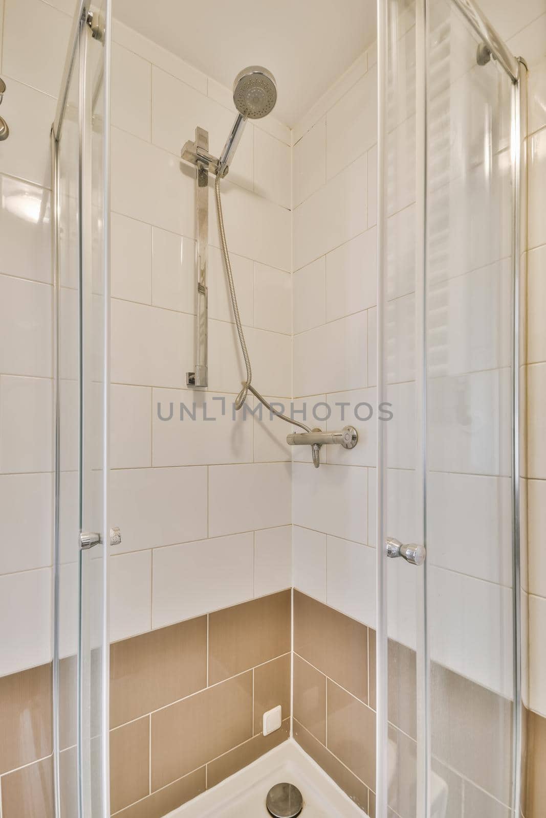 Delightful bathroom with modern glass-enclosed walk-in shower