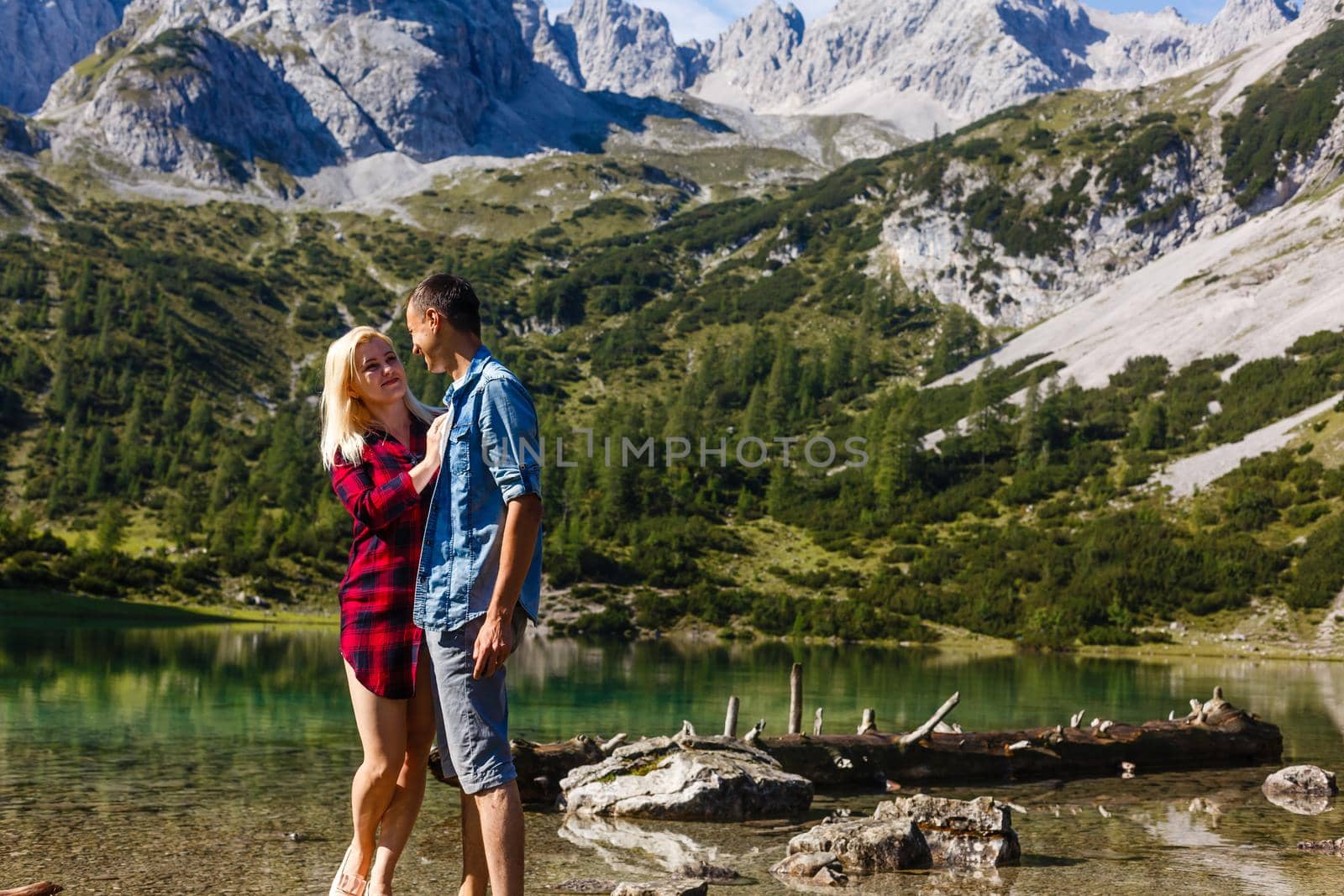 Happy couple with beautiful view of the mountain by Andelov13