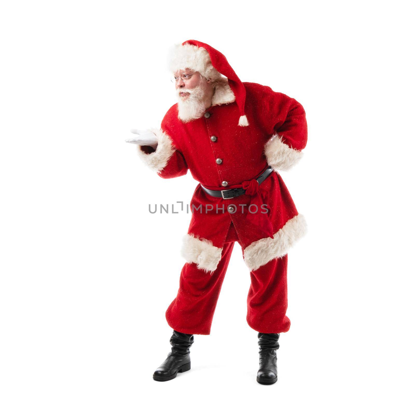 Christmas Santa Claus showing product with hand palm isolated over white background