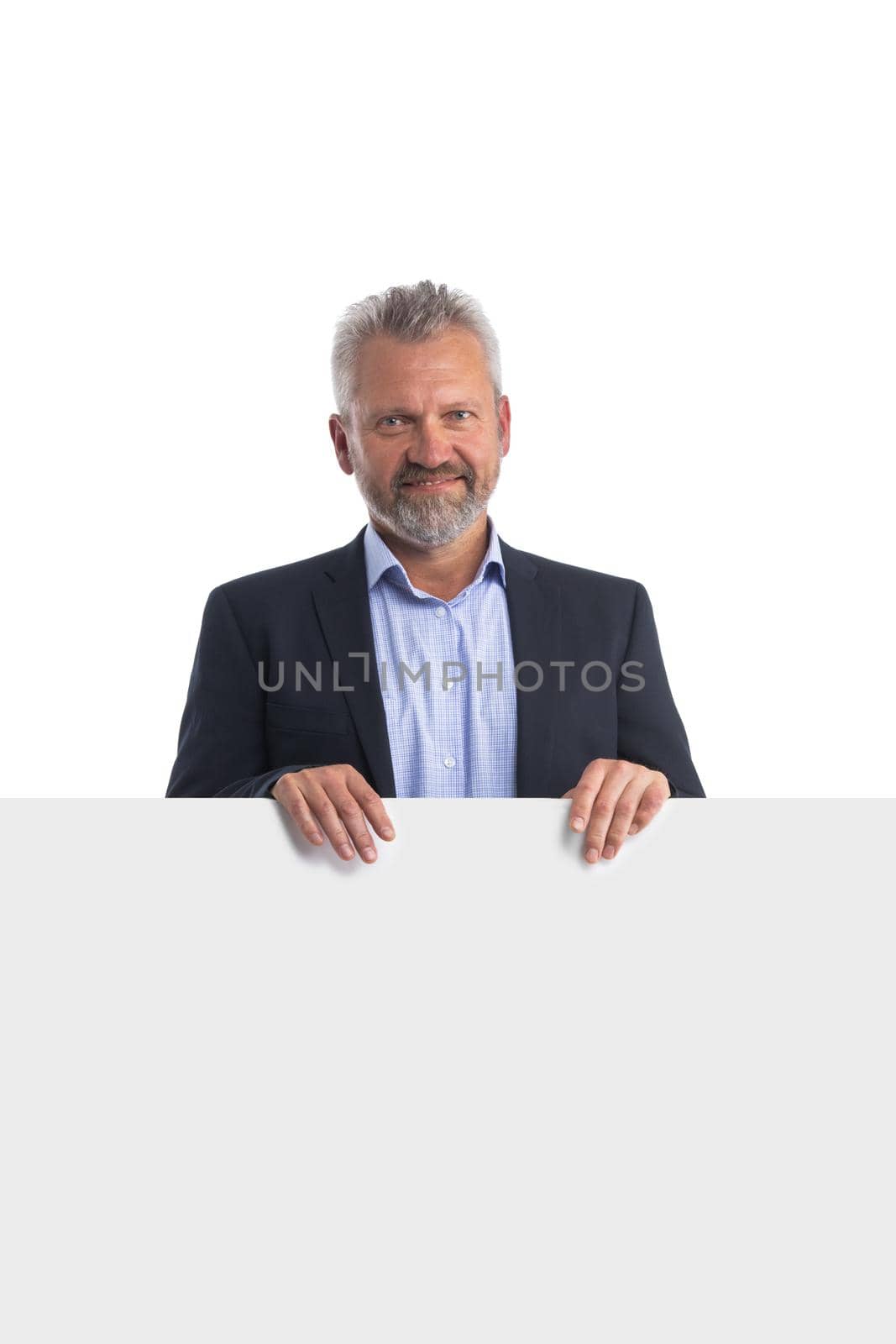 Mature businessman holding banner by ALotOfPeople