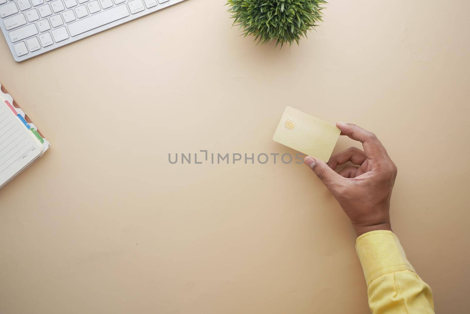 close up of person hand holding credit card.