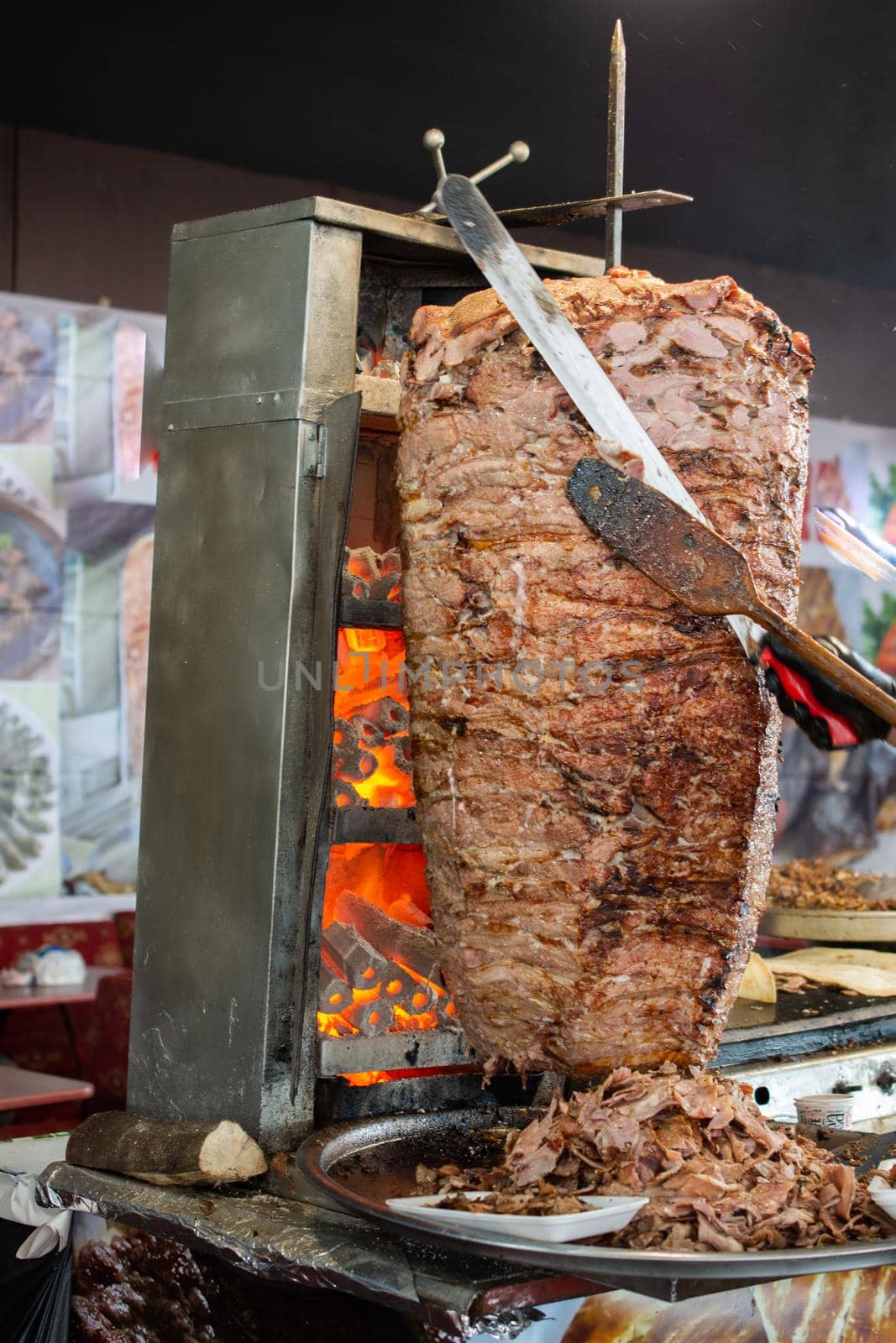 Traditional Turkish Doner Kebab kebab on skewer. Turkish cuisine street food  by berkay