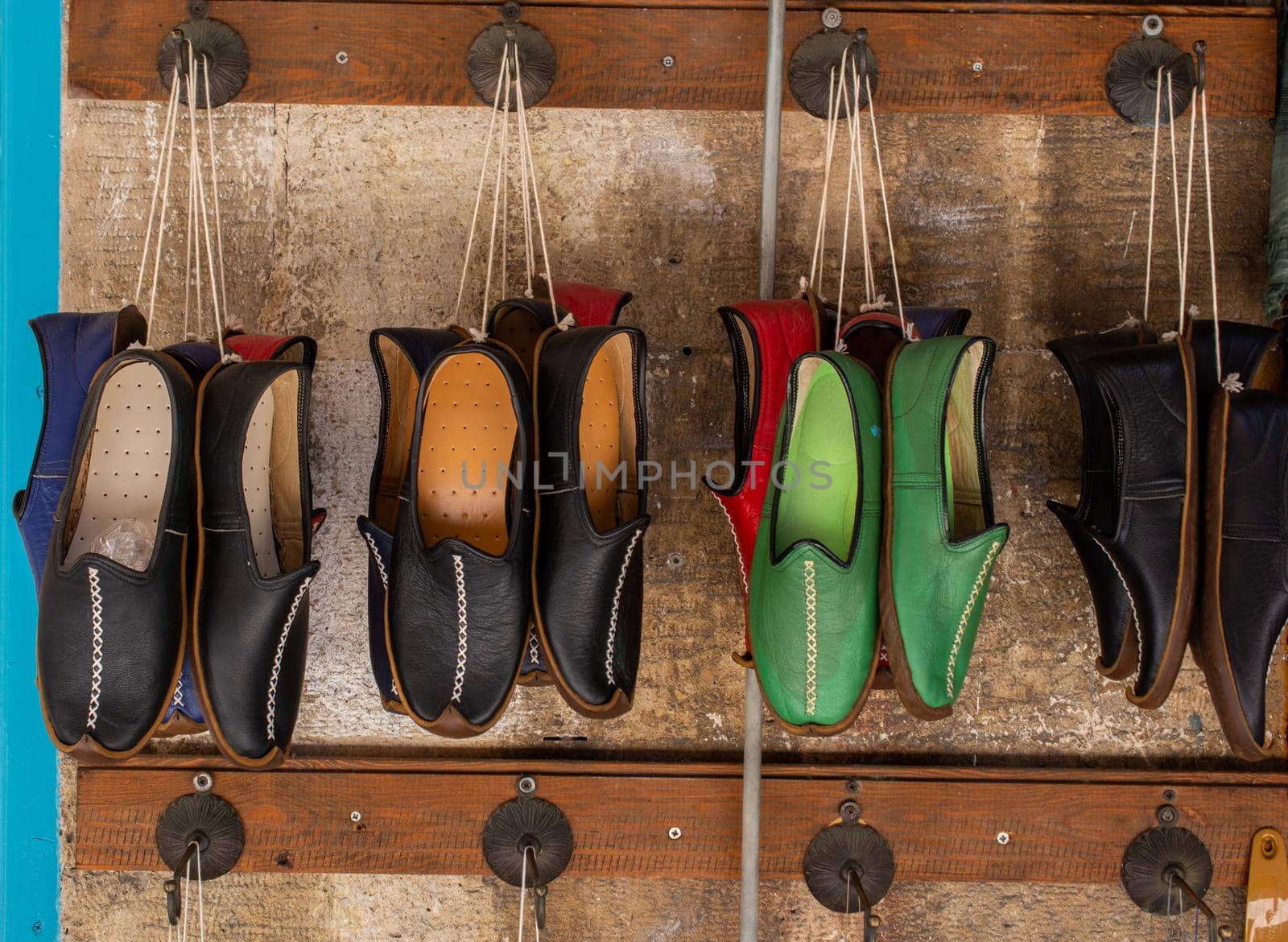 Set of traditional hand made leather shoes in bazaar  by berkay