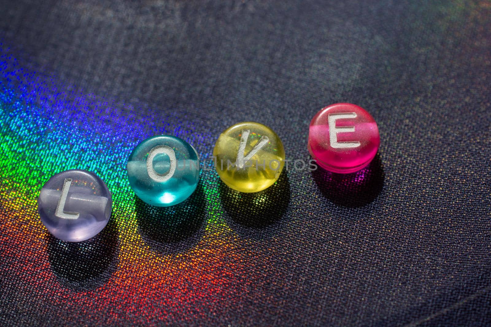 Abstract the word love written with colorful beads by berkay
