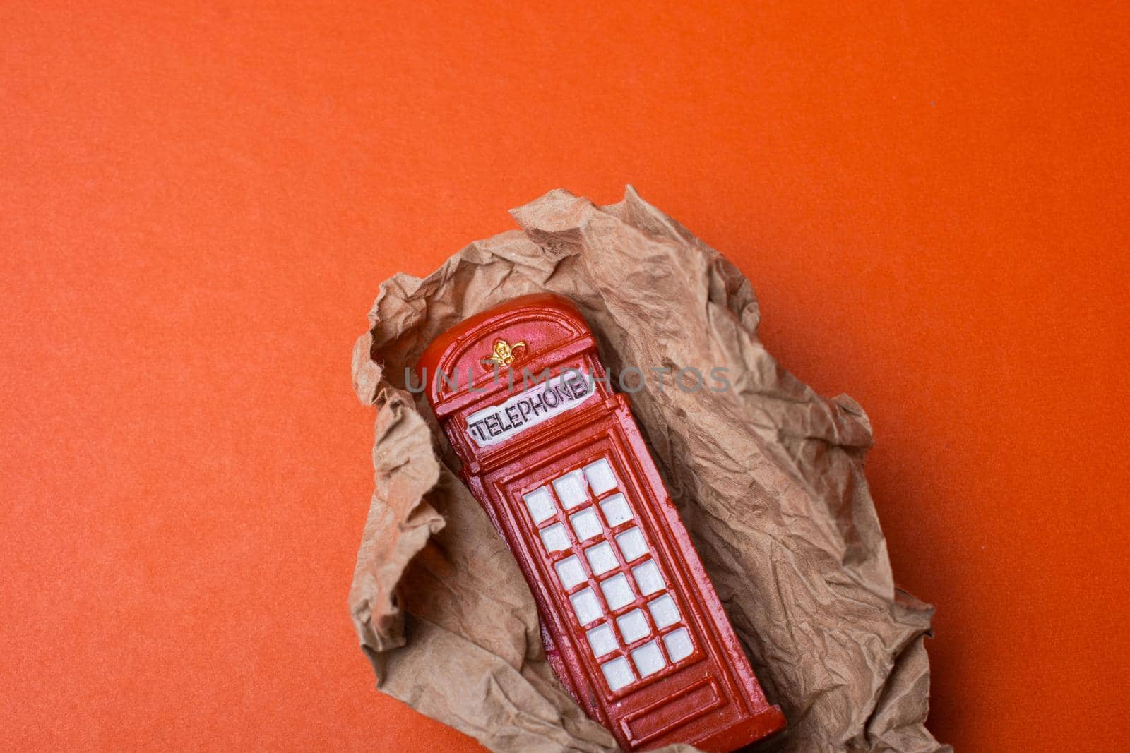 Classical British style Red phone booth on brown paper by berkay
