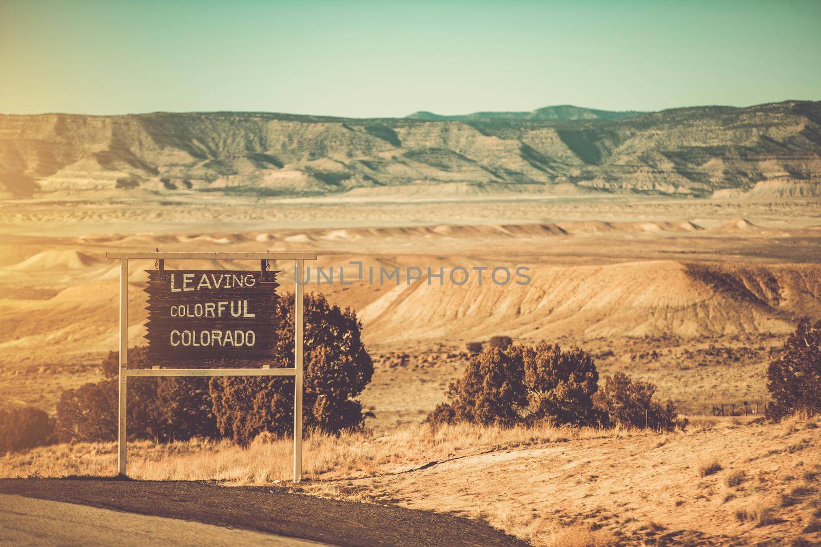 Leaving Colorful Colorado Utah State Border Wooden Sign, United States of America.