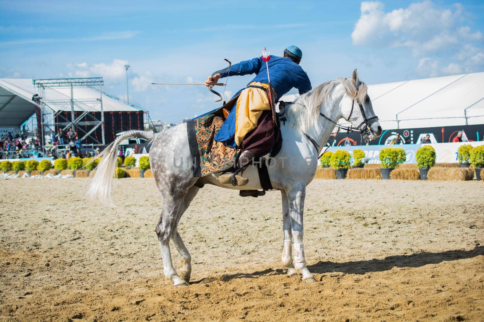 Horseman archer  riding in ethnic clothes on horseback