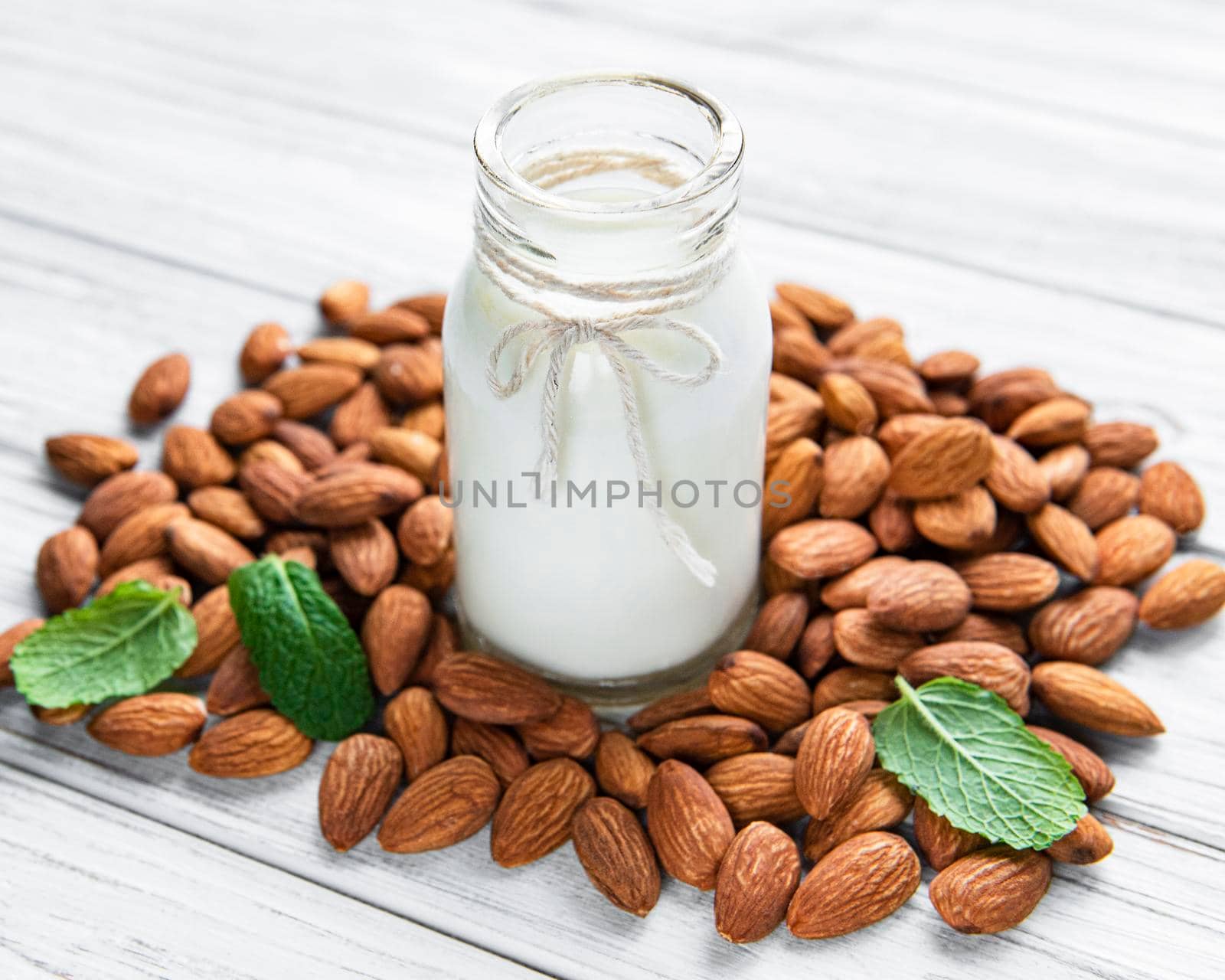Almond milk with almonds by Almaje
