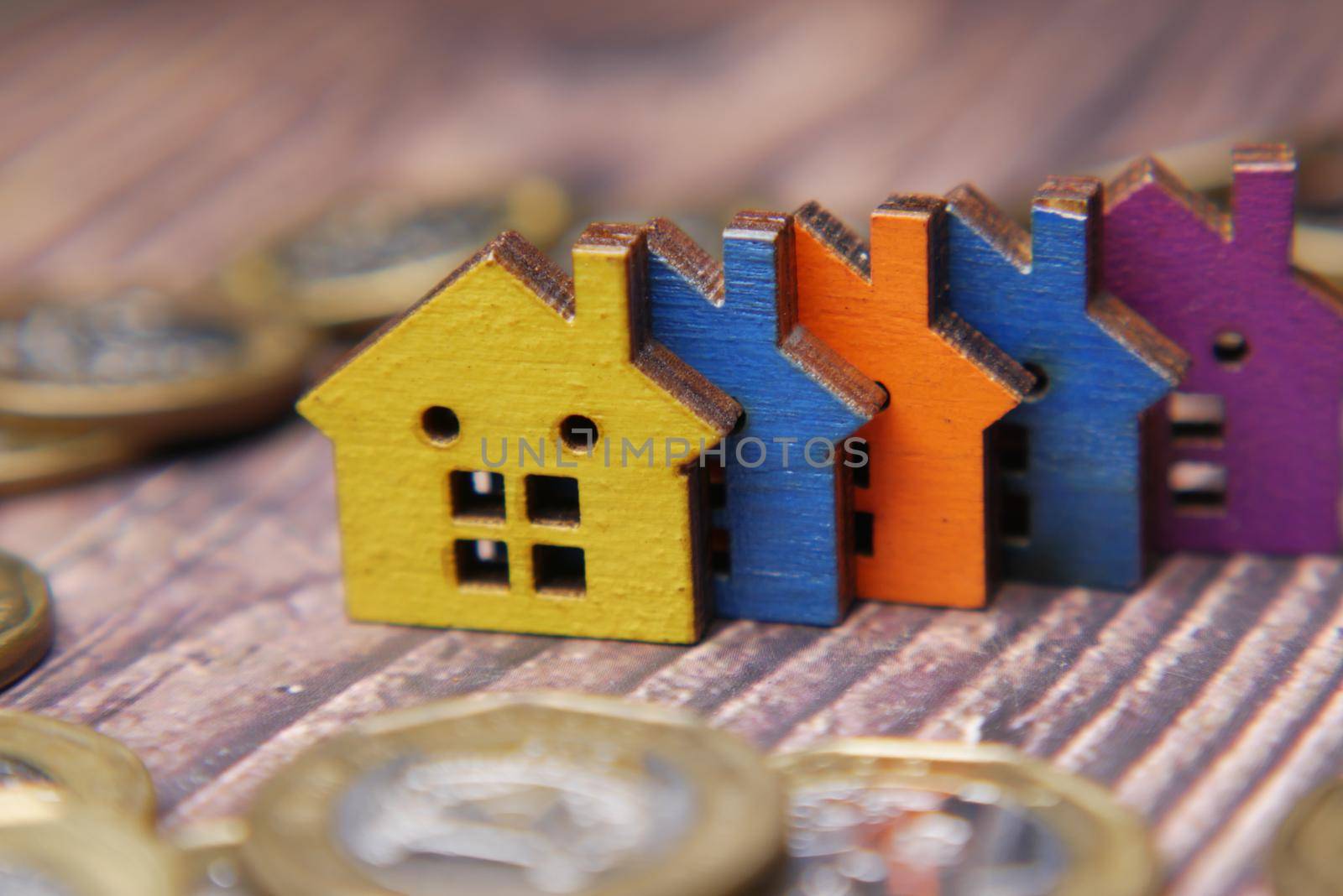 wooden houses on table, the concept of finance concept.