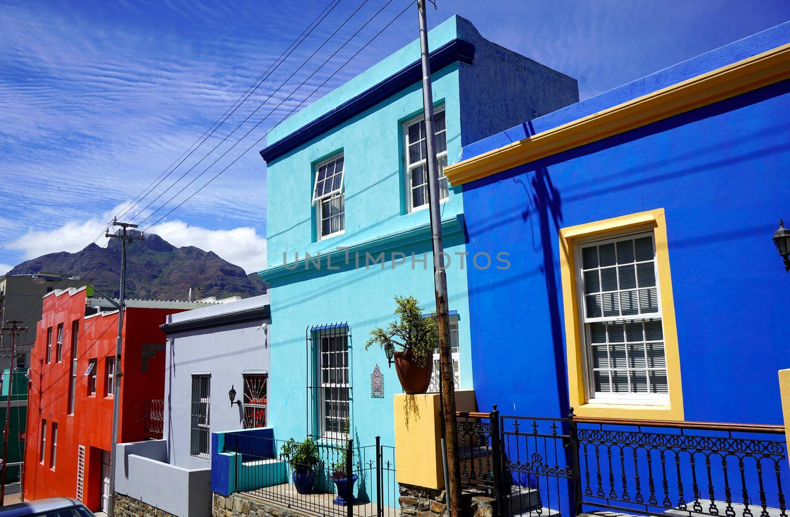  Bo-Kaap district, Cape Town, South Africa - 14 December 2021 : Distinctive bright houses in the bo-kaap district of Cape Town, South Africa