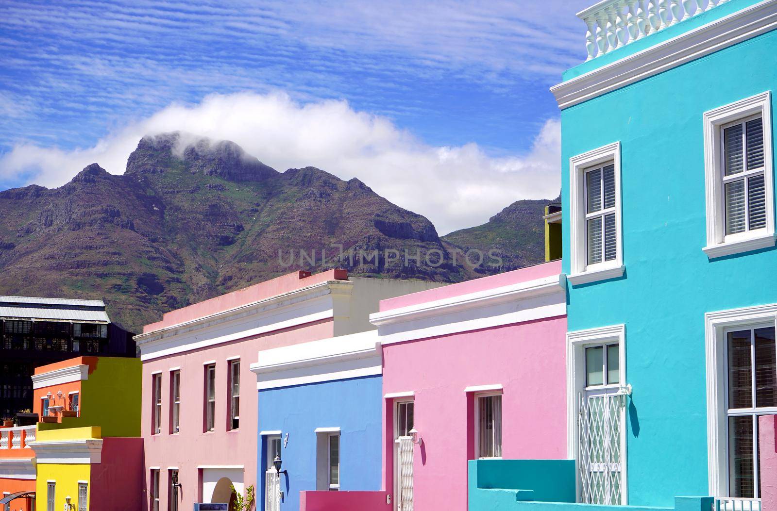 Bo-Kaap district, Cape Town, South Africa - 14 December 2021 : Distinctive bright houses in the bo-kaap district of Cape Town, South Africa by fivepointsix