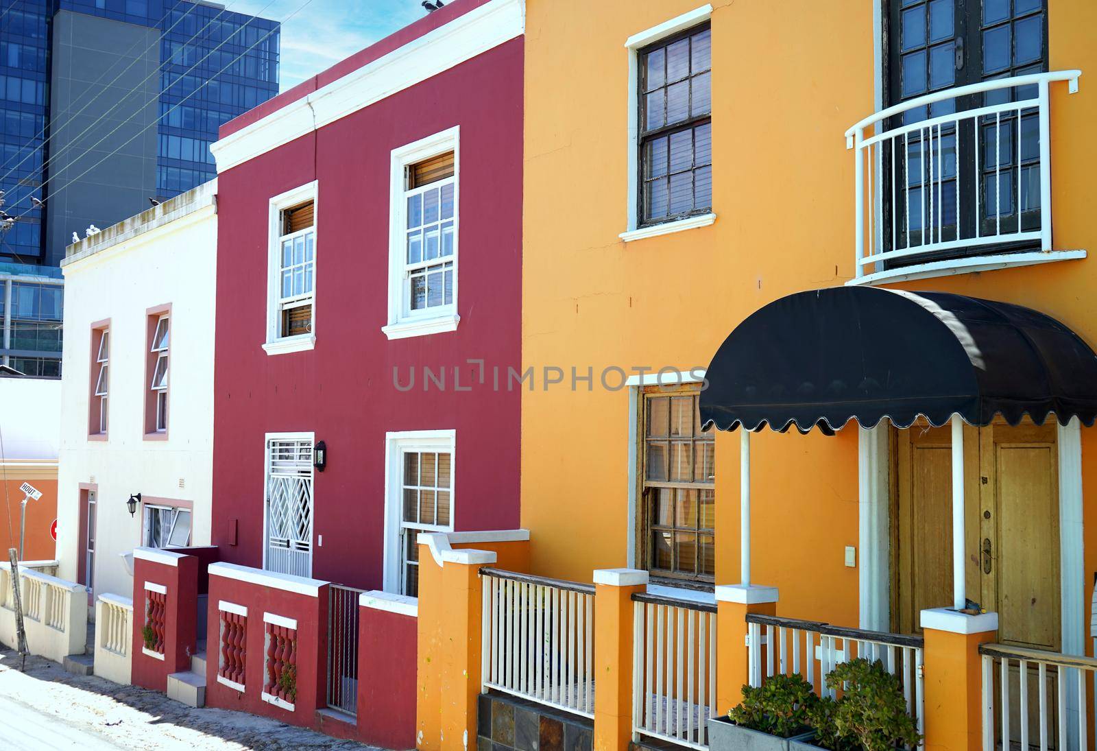  Bo-Kaap district, Cape Town, South Africa - 14 December 2021 : Distinctive bright houses in the bo-kaap district of Cape Town, South Africa