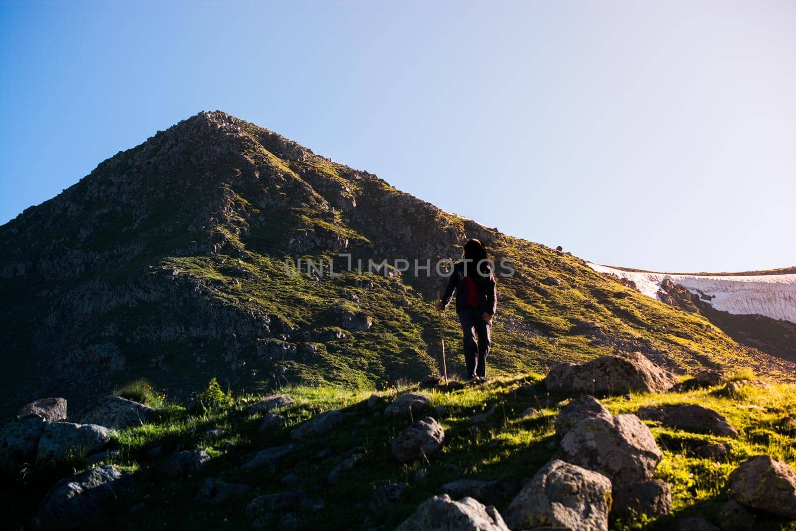 hiker trekking poles walking in Artvin highland by berkay