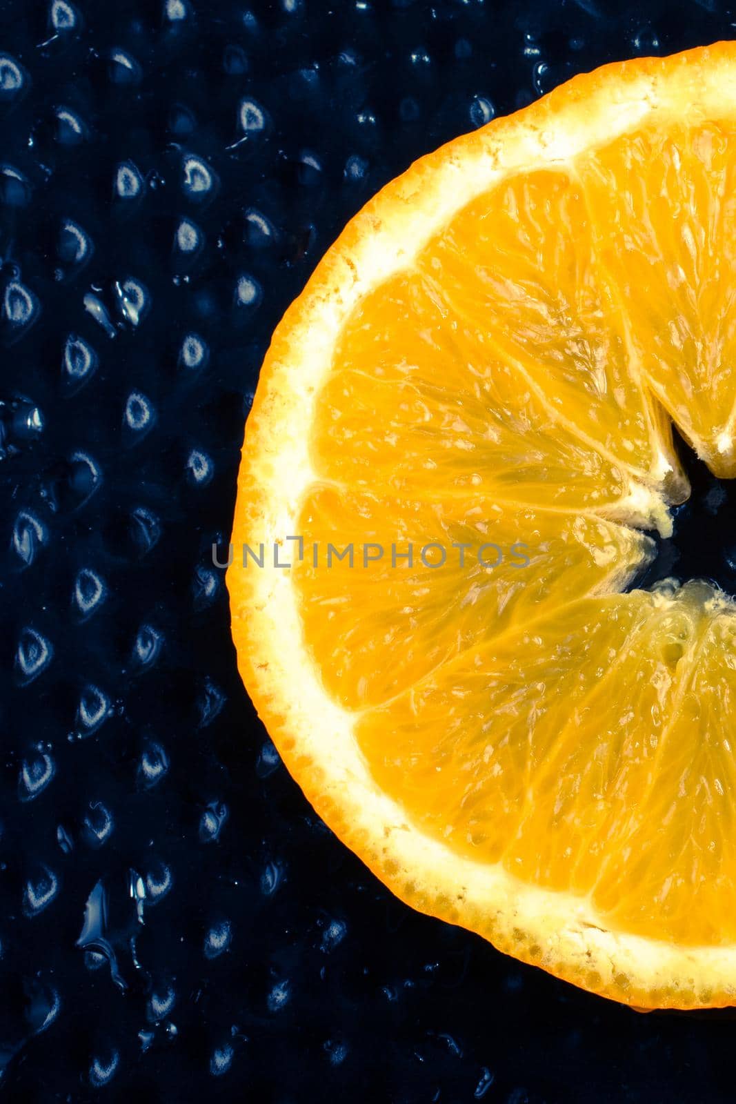 A view of a juicy ripe cut orange fruit by berkay