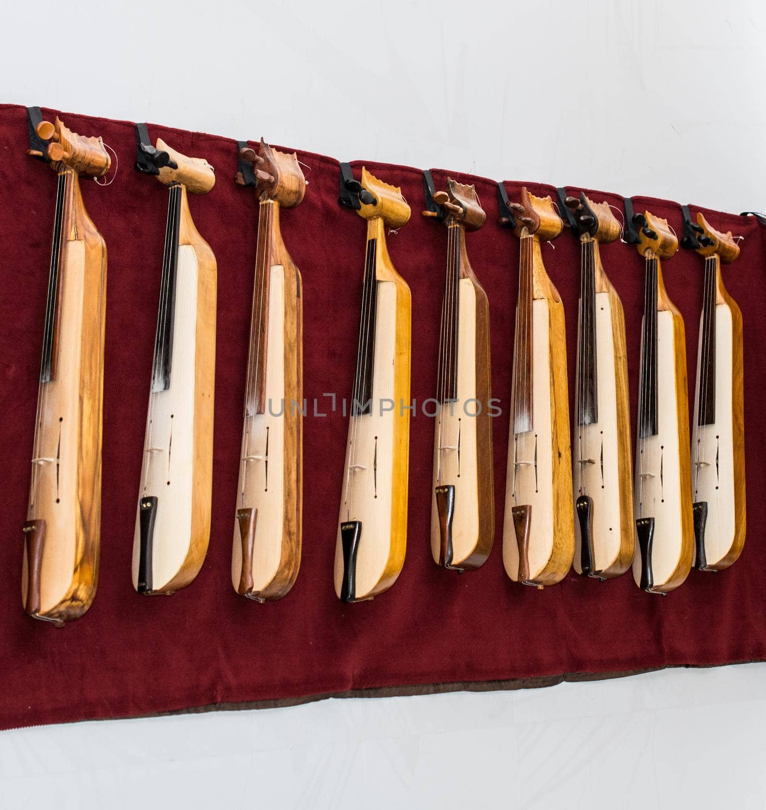 Set of models of musical instruments kemancha made of wood