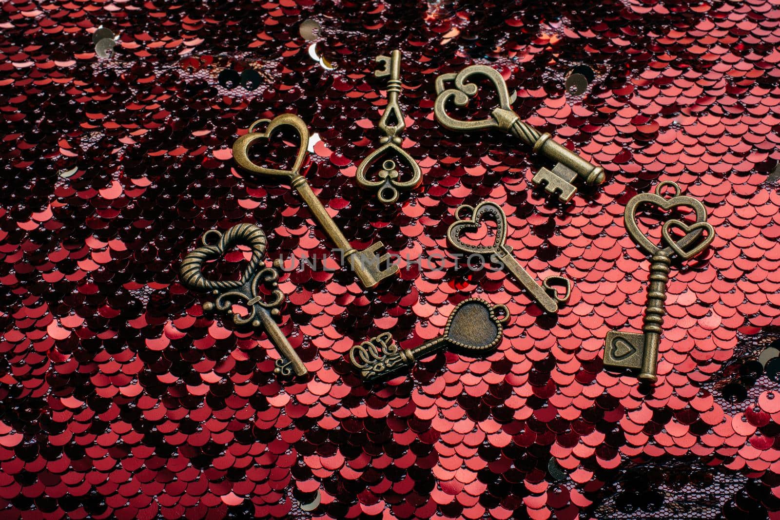 Heart shaped retro metal keys on bright background