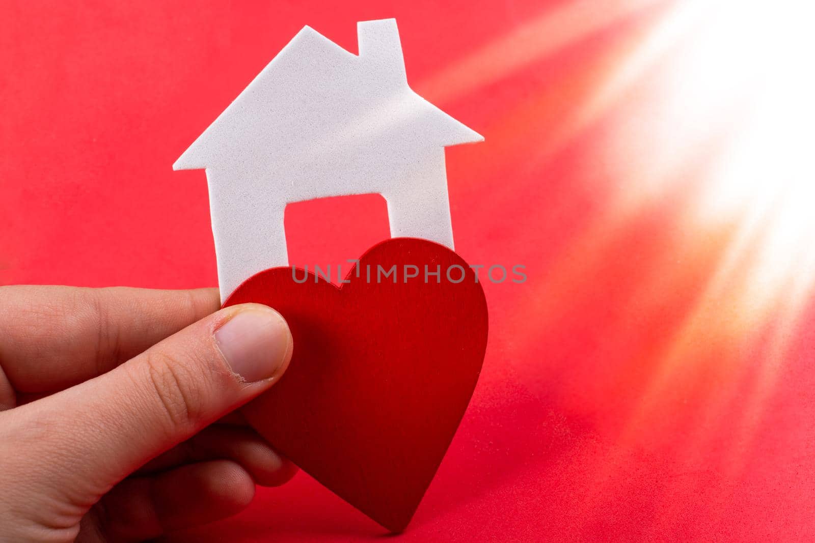 Little paper house and a heart in hand by berkay