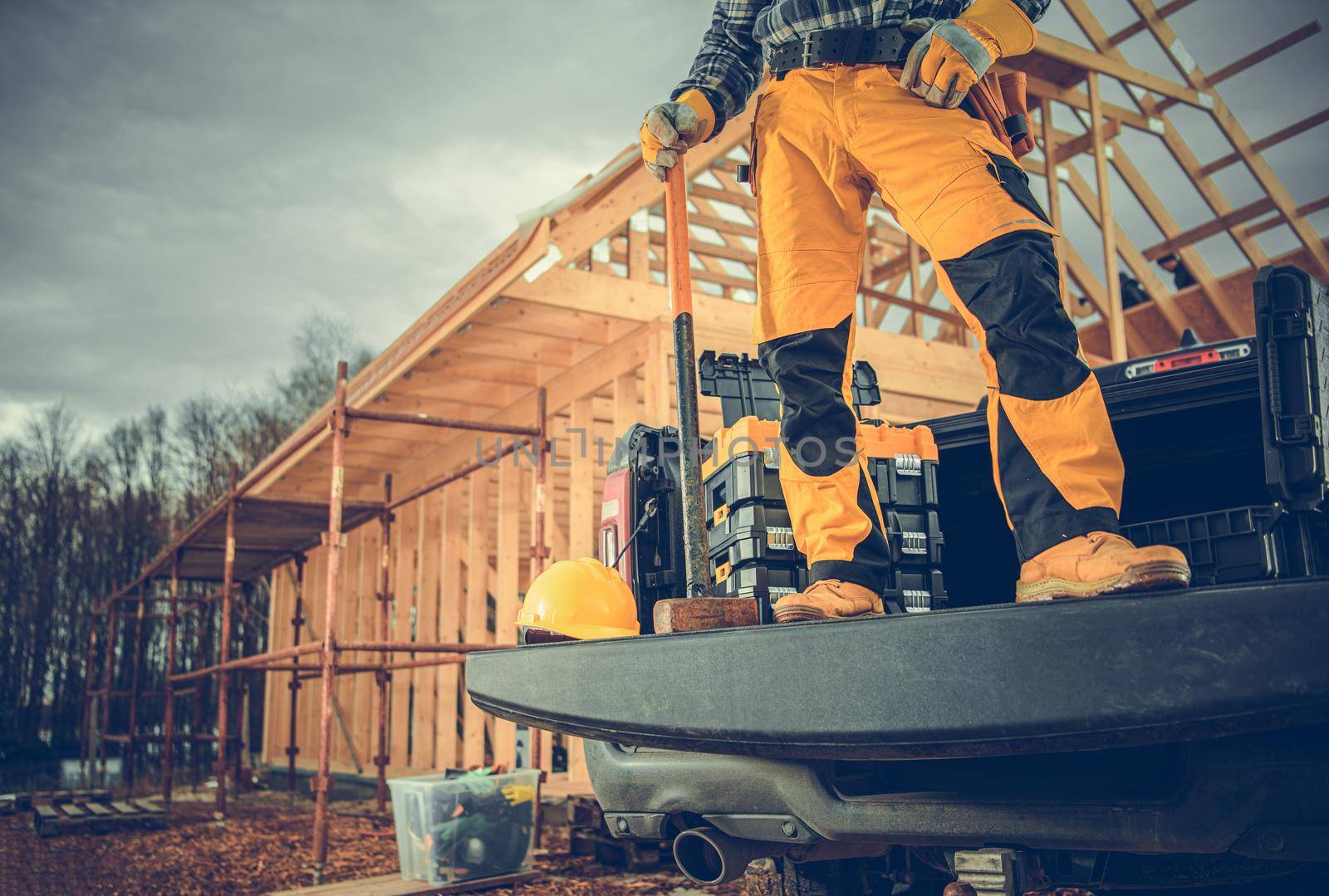 Contractor Worker and the Construction Site by welcomia