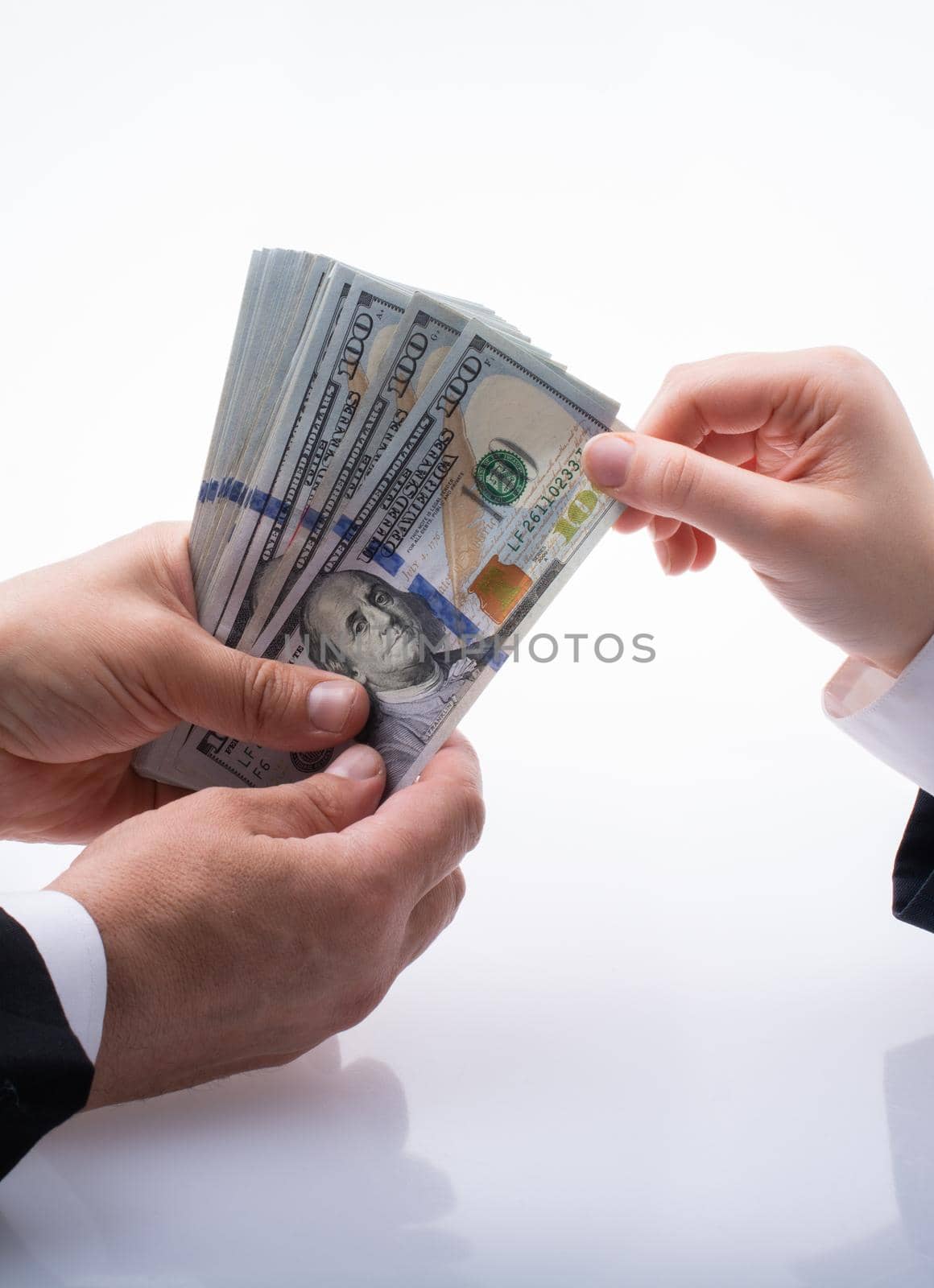 Businessman giving and receiving  dollar banknote money by berkay