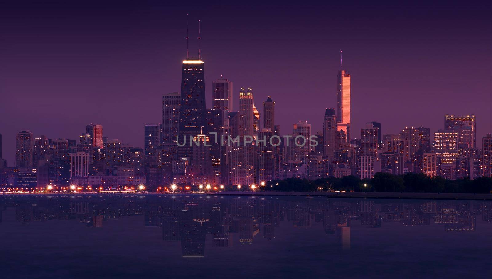 Skyline Chicago During Sunset - Early Evening. Panoramic Photography. Skyline Lake Mirror Has Been Added Digitally. Windy City and Lake Michigan. Horizontal Photo