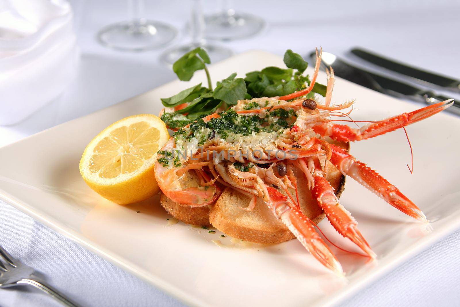 Langoustine Norway lobster Dublin Bay prawns scampi with herb butter lemon and salad
