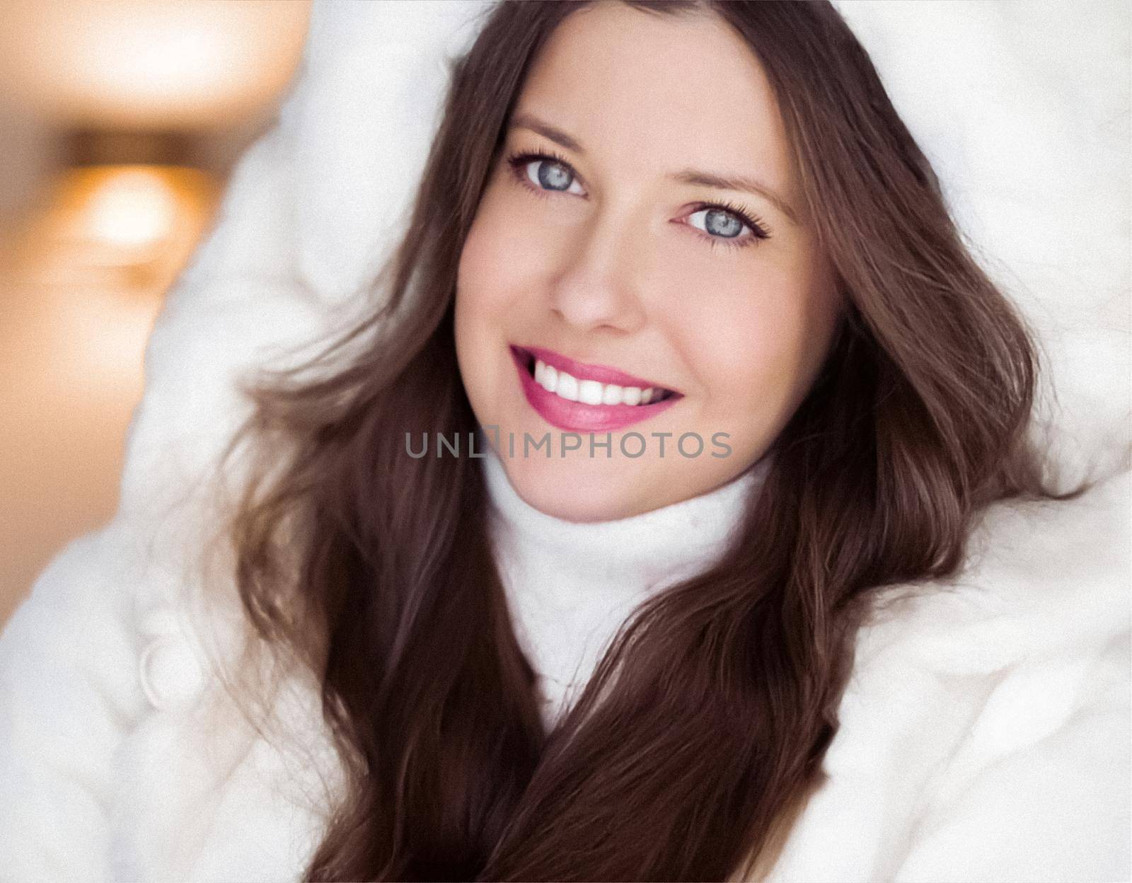 Winter fashion and Christmas holiday look. Beautiful woman wearing white sweater and fluffy fur coat with hood wrap, glamour makeup and hairstyle as xmas portrait.