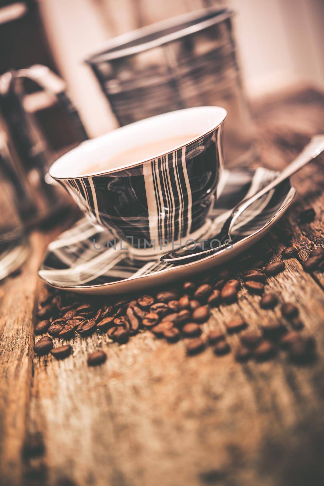 Coffee and Beans. Elegant Tartan Design Coffee Cup and Coffee Beans on Wooden Table. by welcomia