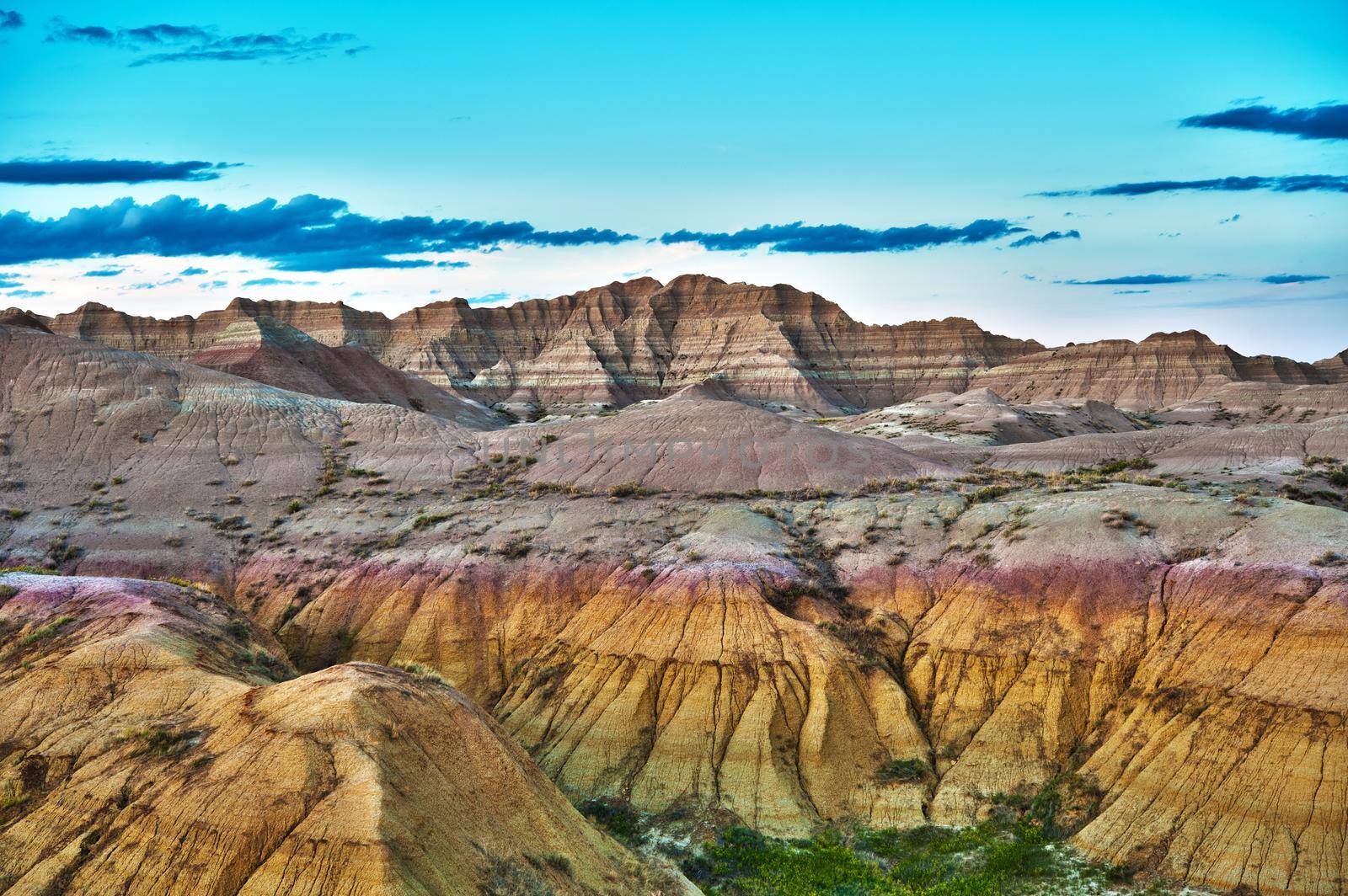 HDR Badlands Formations - HDR Photography. Badlands National Park, South Dakota, USA. Cloudy Blue Horizon, Nature Photo Collection. by welcomia