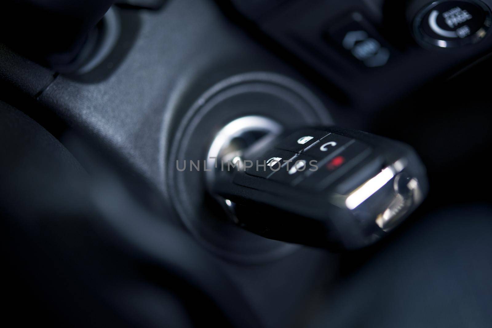 Modern Car Keys with Remote in Ignition Keyhole