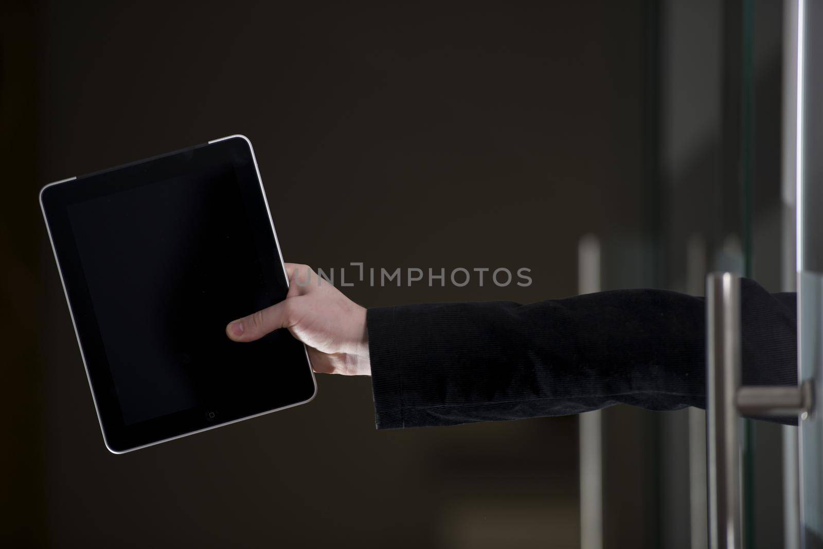 Tablet in Hand - Office Theme. Work Places Photo Collection. by welcomia