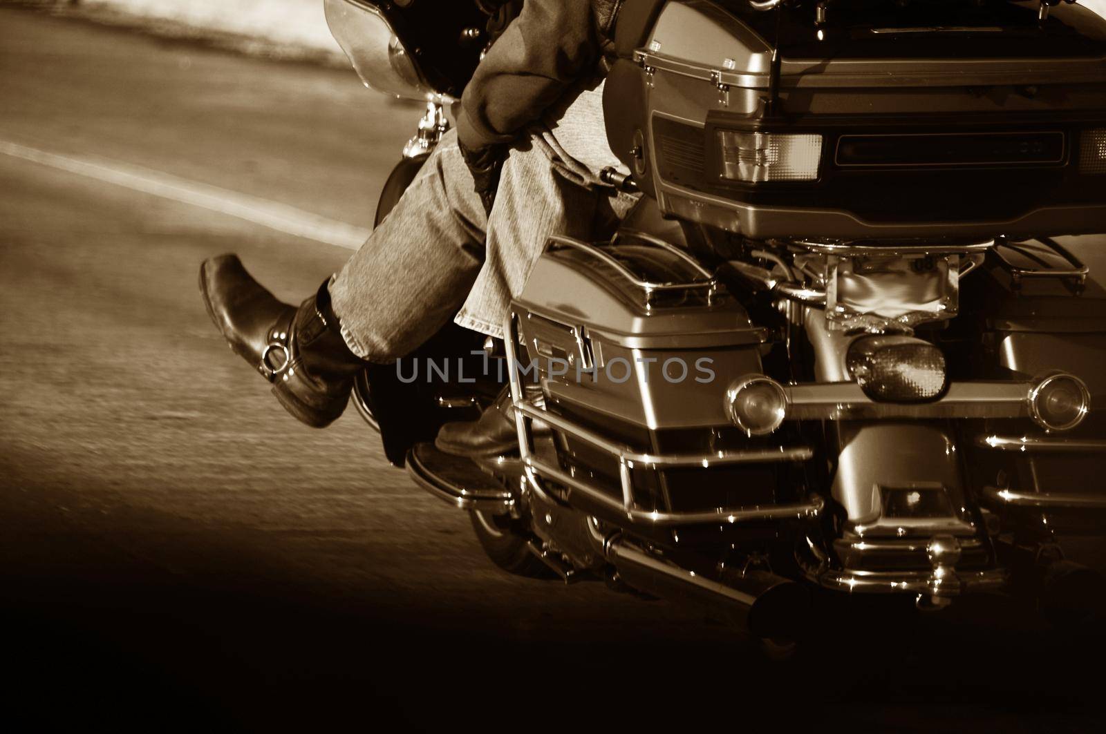 Couple Bikers Sepia Photography. Couples on the Motorbike  - Chopper Riding Down the Highway.