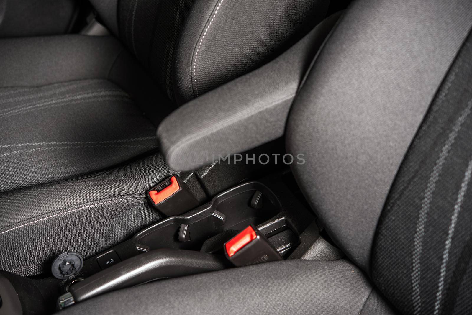 Economy Car Seats and Seating Belts Closeup Photo. Modern Transportation. by welcomia