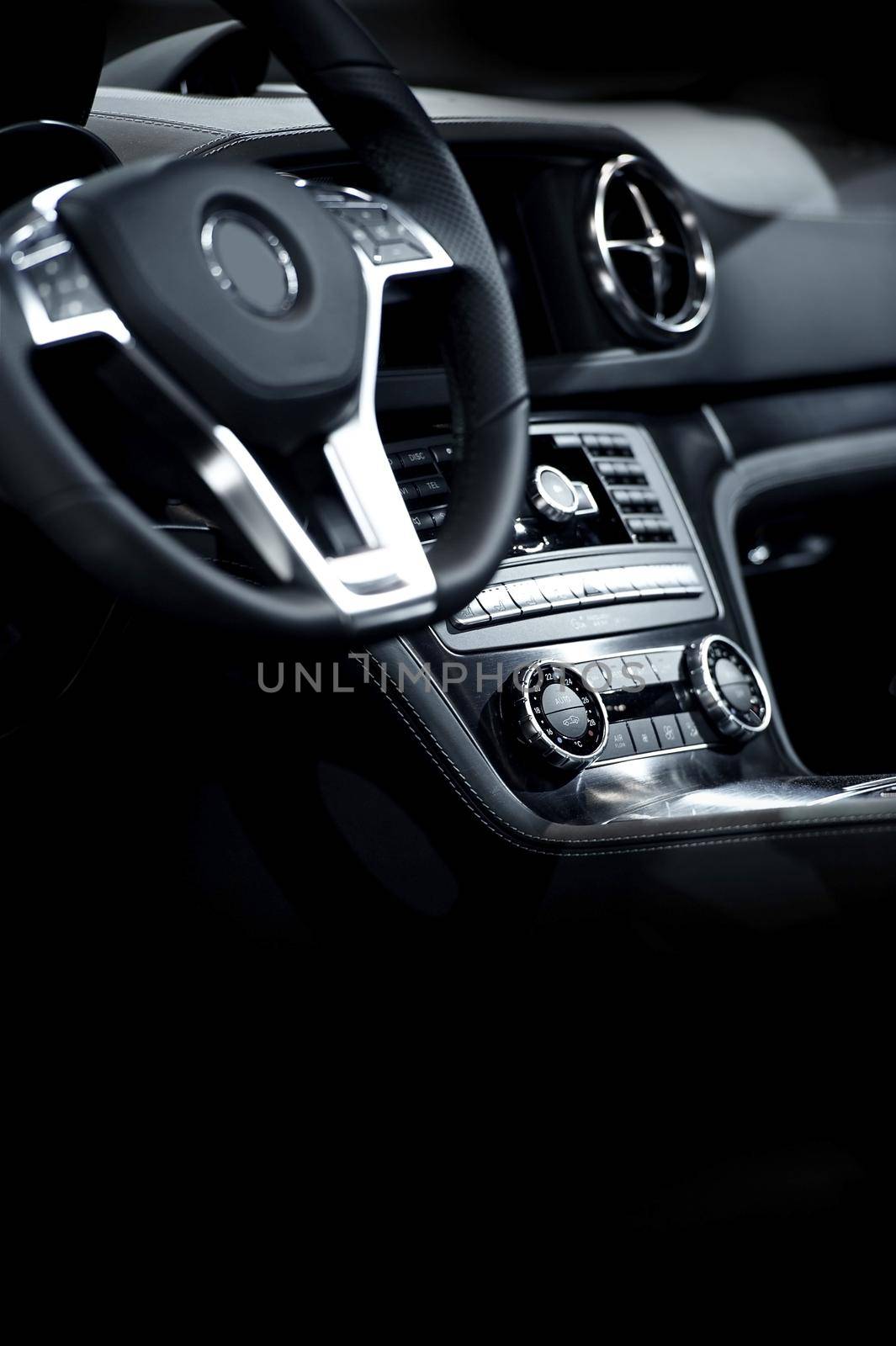 Elegant Modern Car Interior -Dark Leather Interior of Luxury Sport Vehicle. Vertical Photography by welcomia