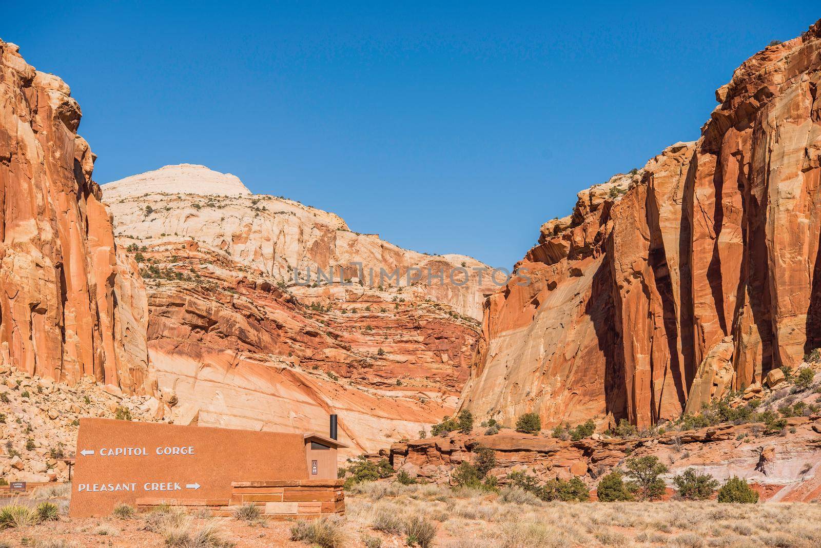 Capitol Gorge and Pleasant Creek Trails Sign in Capitol Reef National Park, Utah, United States.