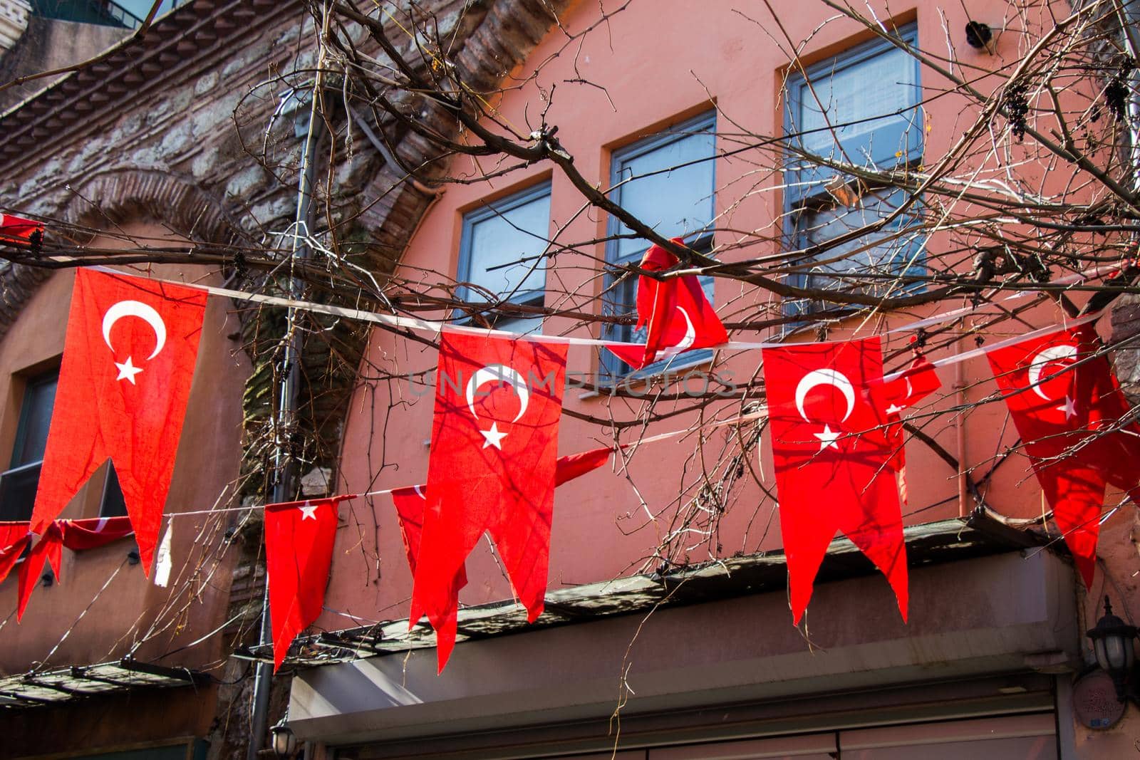 Turkish national  flag hanging in the street by berkay