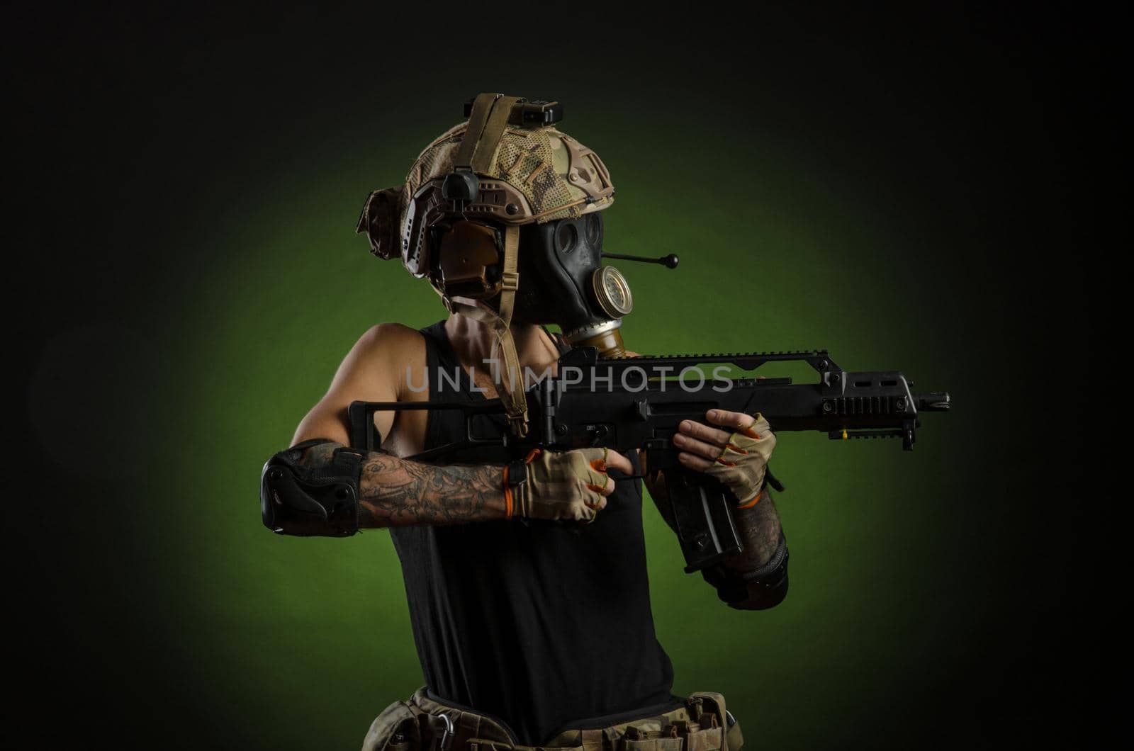 man with a gun in a helmet