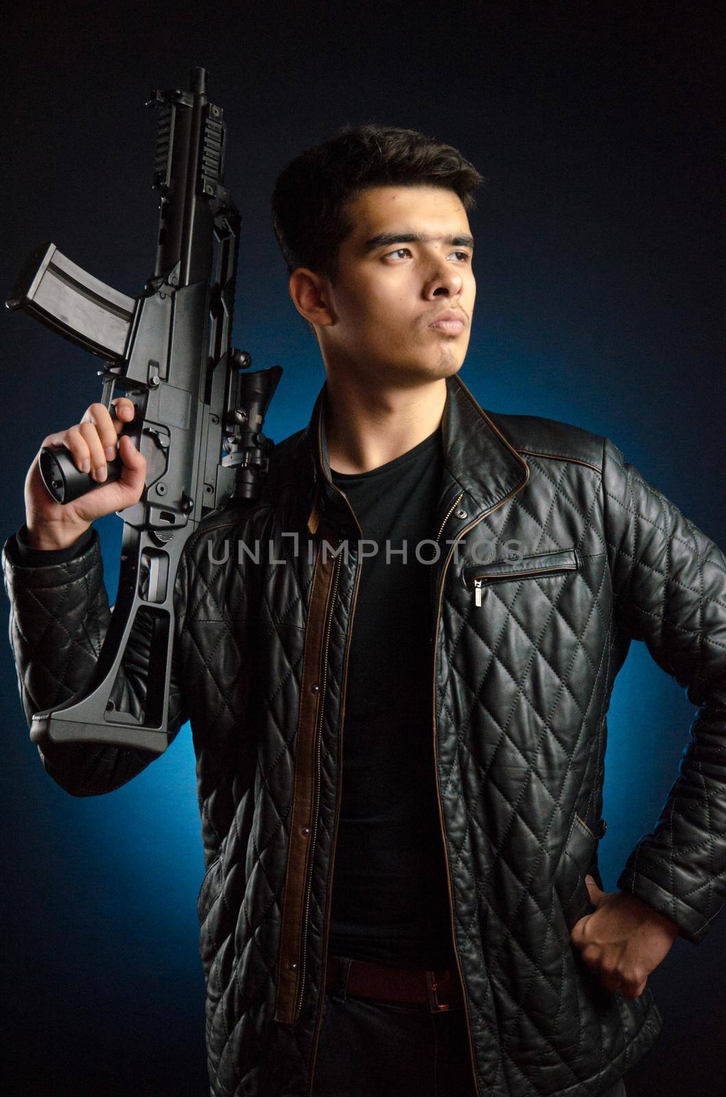 Asian guy in black jacket and automatic rifle by Rotozey