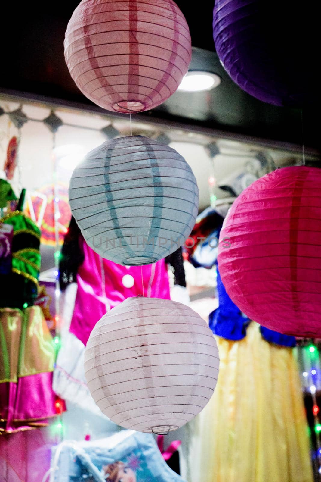 Colorful paper lantern outdoor in a marketplace by berkay