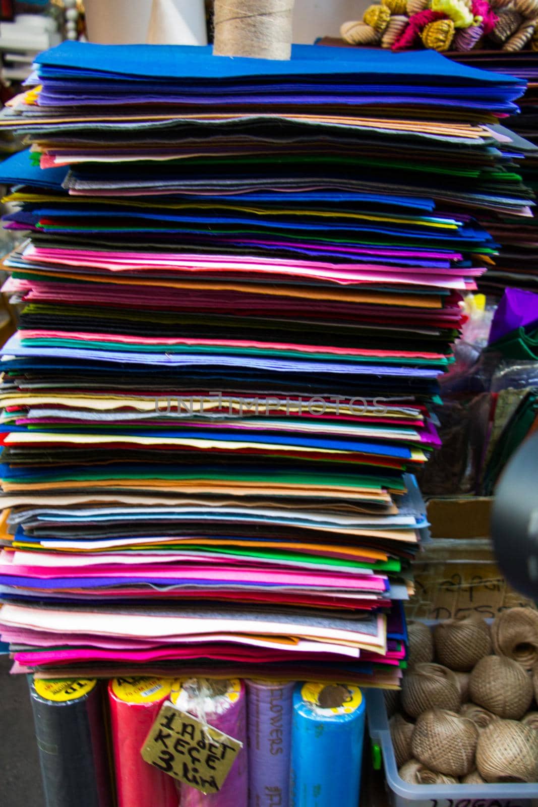 Colorful mats stacked on top of each other in display