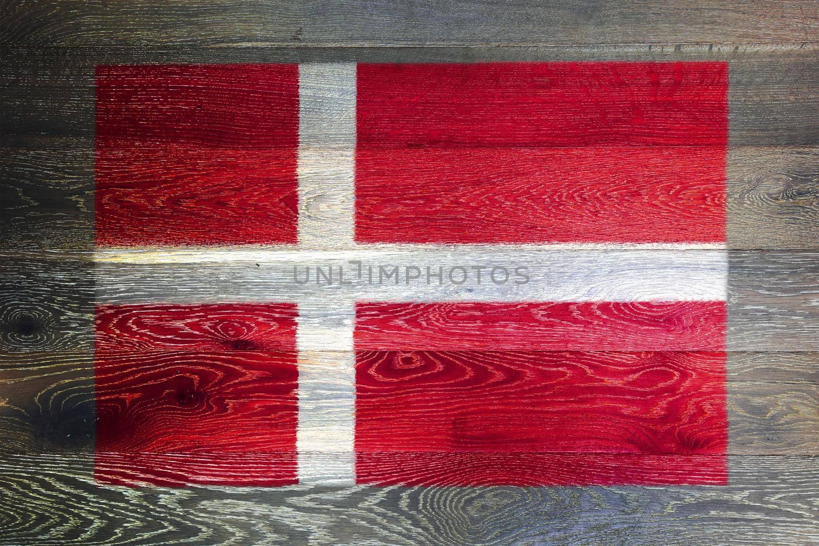 A Denmark flag on rustic old wood surface background