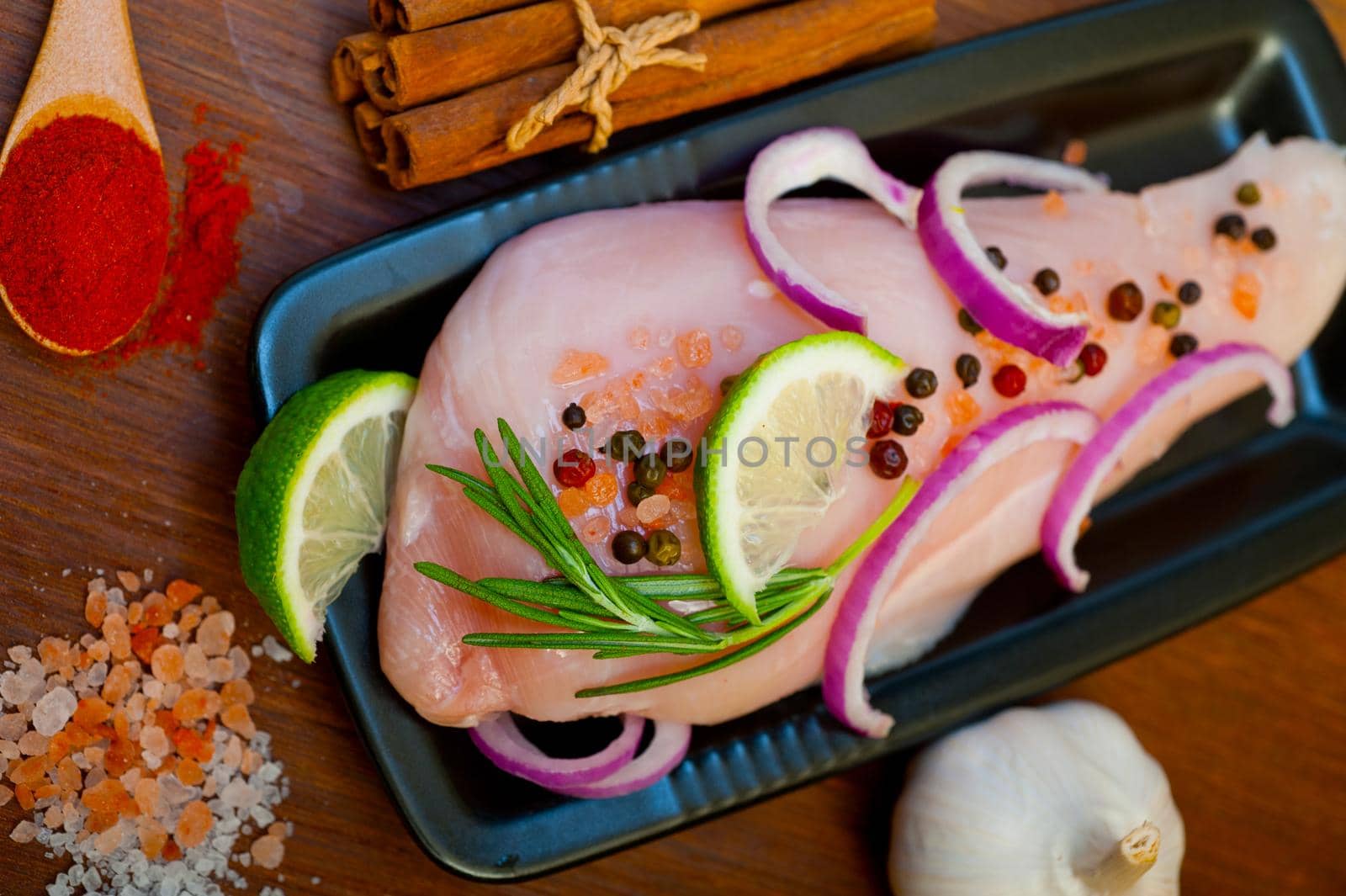 fresh organic chicken breast with herbs and spices by keko64
