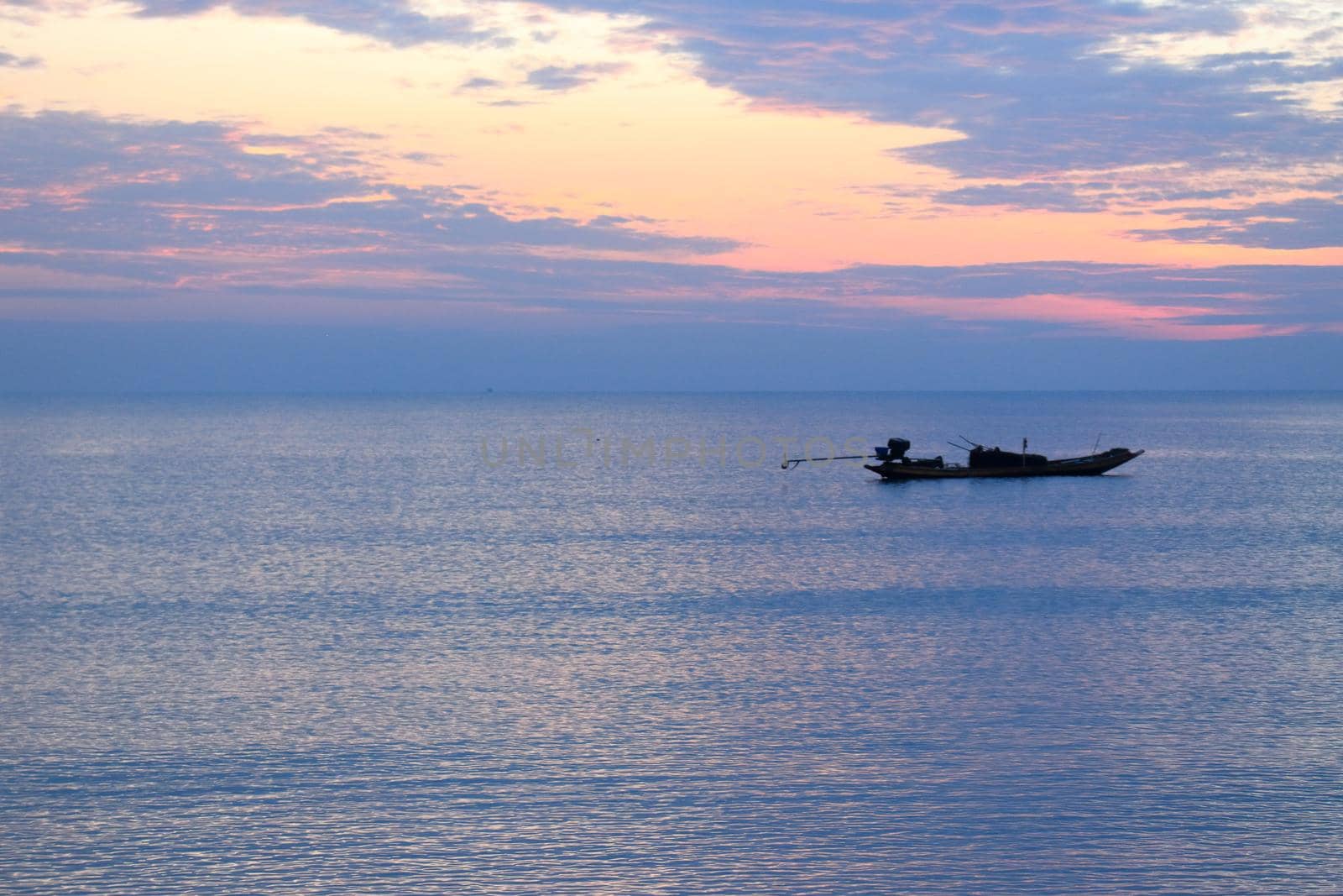 Boat silhouette, early morning, different perspectives, near and far