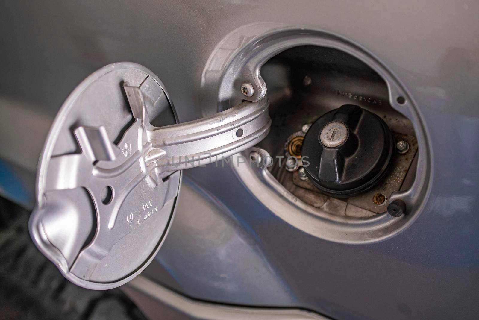 Car fuel door detail opened for refuelling